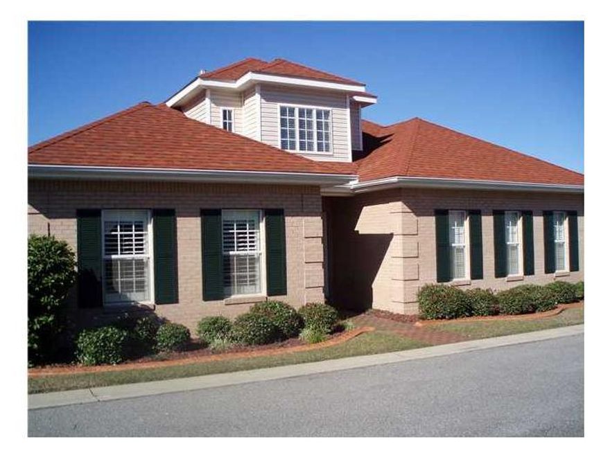 Gorgeous home in the gated community of Magnolia Plantation in Bluewater Bay. This home shows pride in ownership with its tall ceilings adorned with crown molding throughout, plantation shutters, hardwood in the great room and neutral carpet in bedrooms and tile in the wet areas. Home features storage galore, gas fireplace in the great room; and kitchen with solid surface counter-tops, custom cabinetry, and smooth-top stove. Spacious master bedroom with oversized walk-in closet and master bathroom with large soaking tub and separate shower. High-end finishes and custom lighting can be easily found throughout. AC was replaced in 2013.