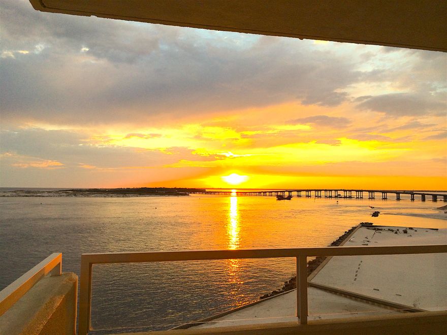 This 5th floor unit in East Pass Towers offers unsurpassed panoramic views of the Gulf and East Pass from every room! Enjoy the fishing boats passing by or the dolphins playing along with views of the Destin Bridge and Crab Island from 600 sq ft of balconies. This is a Martinique floor plan 2100 sq ft, 3 bedrooms, 2.5 bathrooms and two open Living areas. Owners have transformed the property with a back to the studs renovation that includes a spectacular open plan main living area that is built for entertaining. The kitchen features an extra-large (seats eight) breakfast bar, granite counters, custom cabinets, travertine back splash, stainless appliances, soft close drawers/cabinets, Hansgrohe faucets, new tiled floors with maintenance free epoxy grout.