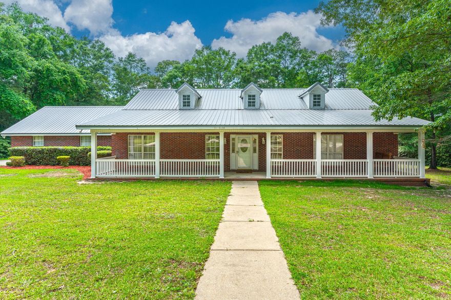 $15,000 TOWARDS CLOSING COSTS!!Experience the charm of country living in this inviting ranch-style brick home situated on 1.4 acres of picturesque land.  Nestled in the heart of a private and serene area, this residence boasts a welcoming ambiance perfect for families seeking a tranquil retreat to call their home. As you step inside, you are greeted by an oversized family room that offers a fireplace to add that cozy feeling while creating the ideal setting for gatherings and relaxation.  The spacious layout offers ample room for entertaining and everyday living, while the large windows fill the space with natural light.Are you a family that loves to cook or just spend time in the kitchen? This spacious kitchen offers lots of counter and cabinet space perfect for storing all your cookware, utensils, and ingredients, ensuring that everything is within easy reach making every culinary enthusiast's dreams come true. 

Enjoy the family gathered around in generously large dining room which flows seamlessly into the kitchen to allow for you to not miss a beat while you create delicious meals and unforgettable memories. 

Outside, this property truly shines with a big, beautiful backyard that provides a private oasis for all your outdoor activities and enjoyment.  Imagine hosting barbecues, gardening or simply unwinding on your oversized back deck while you enjoy the peaceful seclusion of your backyard paradise.

For those with a passion for hobbies or DIY projects, a detached garage/workshop on the property provides the perfect space to unleash your creativity and craftsmanship.  Additionally extra garage space offers lots of storage for more vehicles, toys and tools ensuring your organization and functionality are always at your fingertips.

Completing the picture of idyllic of country living is the expansive front porch, where you will find yourself sipping your morning coffee, catching a glimpse of the sunrise or simply soak in the tranquility of your surroundings.  Call now to schedule your private tour! 
