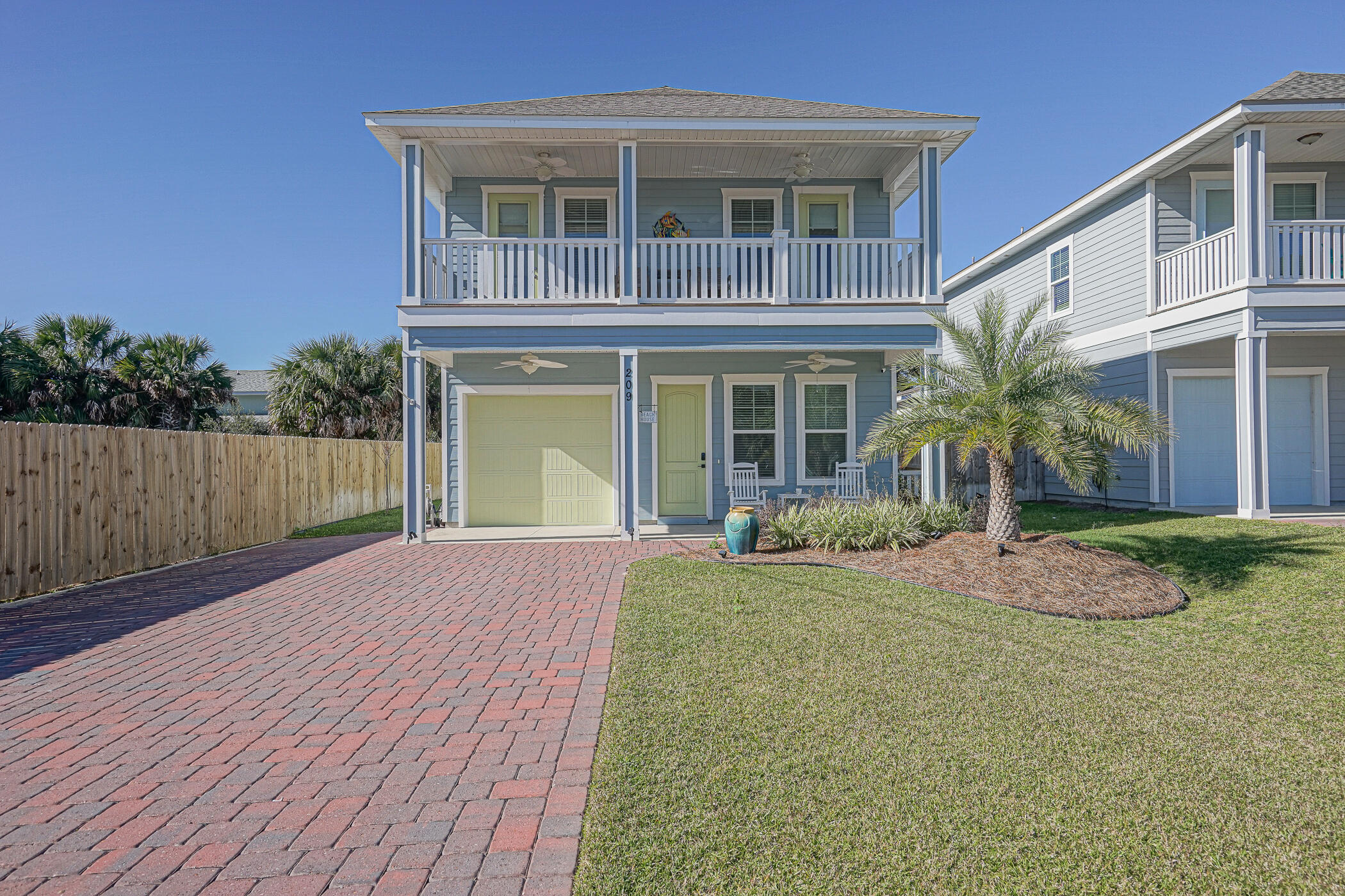 Only one block away from the Gulf at Laguna beach!! Whether you need a full time beach home or a vacation rental, this FULLY FURNISHED home is the perfect fit! Offering 4 bedrooms (2 master suites. one on each level), 4-1/2 baths, two living areas, great porches, balconies and a fully fenced back yard large enough for a private pool, this home offers you your own slice of paradise.