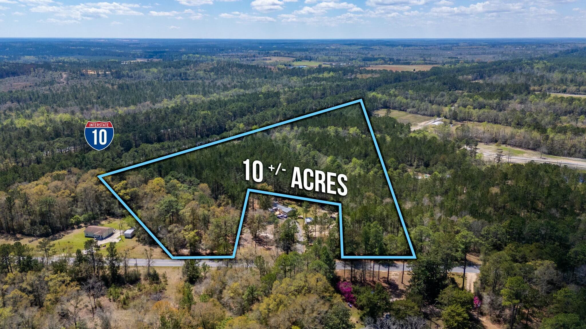 Discover the perfect blend of natural beauty and potential on this stunning 10-acre parcel, partially planted in mature pines and offering a peaceful, private setting. A picturesque, year-round creek flows through the back corner of the property, adding charm and character to the landscape. Zoned Rural Village, this versatile land offers a range of possibilities, from a private homestead or hobby farm to small-scale development opportunities. Whether you're looking to build your dream home surrounded by nature or invest in a property with future potential, this one checks all the boxes. The sale is subject to a lot split. The home is not included in the sale. See photos for an approximate split.