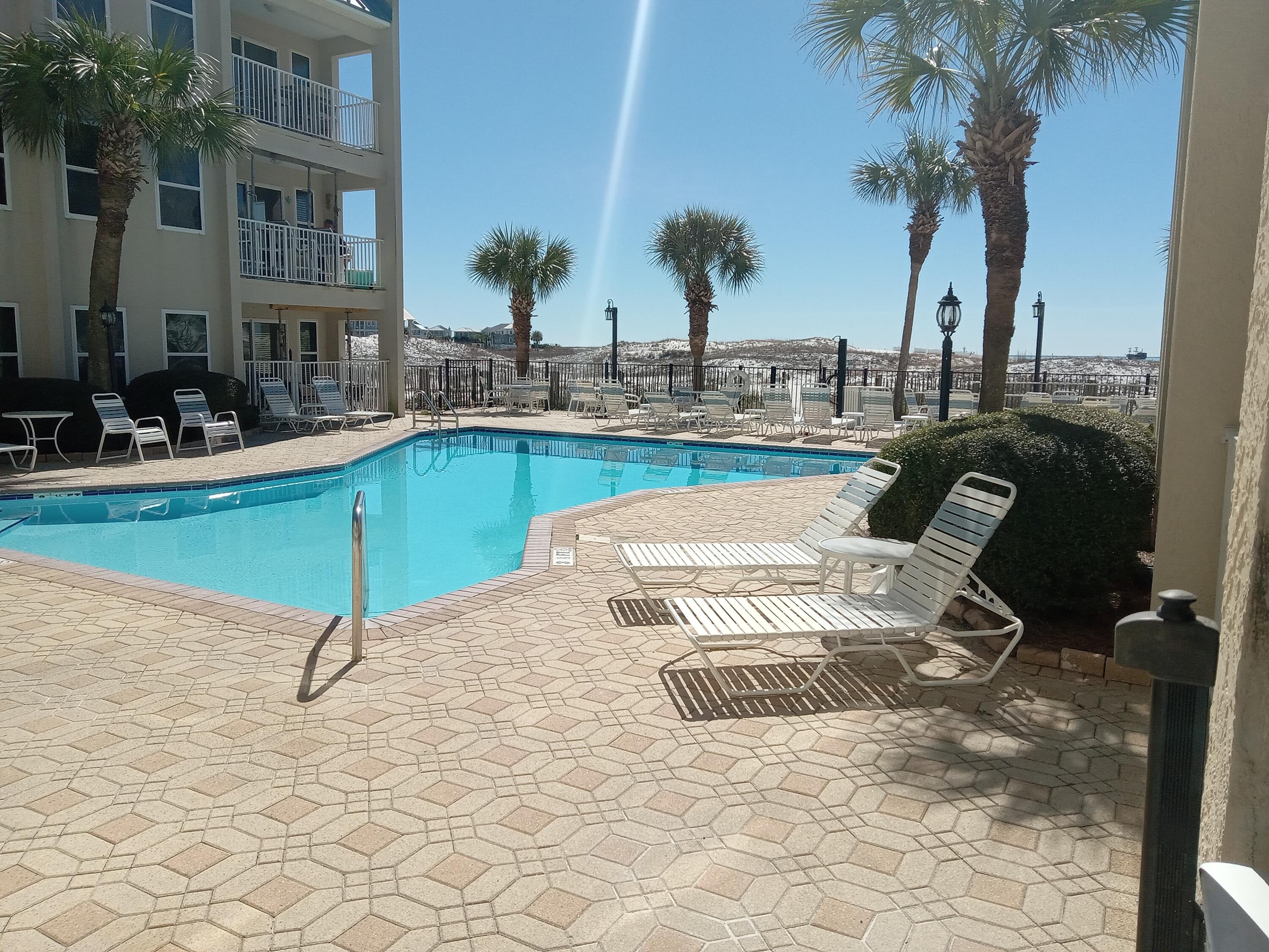 POOLSIDE VILLAS CONDO - Residential