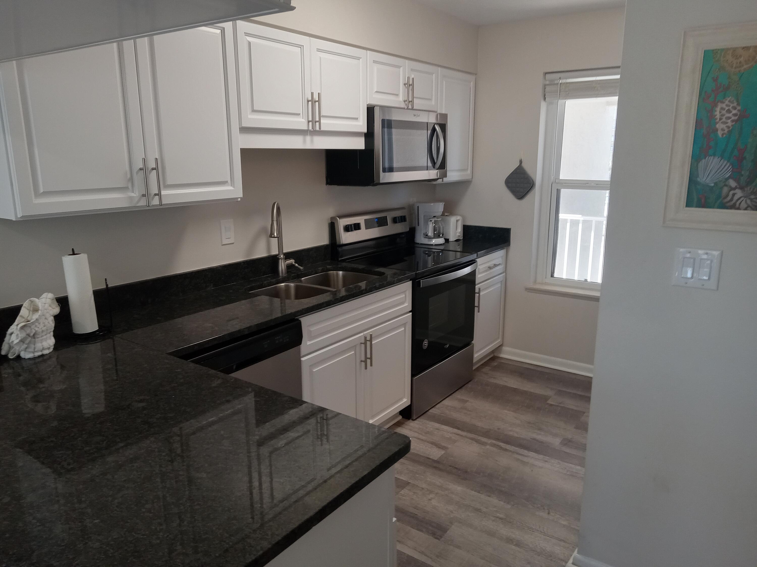 POOLSIDE VILLAS CONDO - Residential