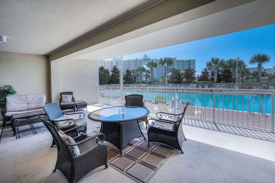 Don't miss this great deal in the Seascape Golf Beach & Tennis Resort! Ground floor 2BD/2BA fully furnished condo in Ariel Dunes II. This unit not only offers comfortable living in the inside but also boasts an approx. 500 square foot private, covered patio overlooking one of many pools. The kitchen has granite countertops, natural wood cabinets, a breakfast bar, and additional dining area for 6 and living space that opens to the patio. Unit is great for families as your right by the pool! This resort property has it all - On site dining, pools, tennis, championship golf course, bike rentals, and access to the beautiful Gulf of Mexico.