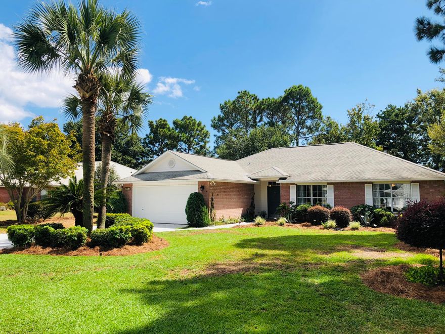 Fall in love with this home and neighborhood! This beautiful 3 bedroom, 2 bathroom home sits on more than a third of an acre and is just a block away from Choctawhatchee Bay and Grass Lake. Located in the community of Raintree Estates, this neighborhood offers a community dock, private beach park by the bay, with walking and jogging trails & ball field. Surrounded in a tropical paradise, this home has a thoughtfully designed split floor plan and offers both indoor and outdoor living, quality updated finishes to include wood plank tile, new lighting, appliances, freshly painted and keyless entry. The layout includes a generous living room with vaulted ceilings and fireplace, an eat-in kitchen with stainless steel appliances, a substantial master suite with ensuite and walk-in closet a laundry room with Maytag washer and dryer (2016), and a finished 2-car garage with epoxied floor. Ready to relax outdoors?  Enjoy your favorite beverage lounging in the enclosed tiled sunporch looking out on the beautifully landscaped garden or grill up burgers on the bricked patio.  This home, neighborhood and community offer an exceptional way to live.  Niceville has top rated schools in the state, is centrally located to bases, shopping and dining.  Here are some finer details for this home:  Roof (2005), Sprinkler Pump (2014), Fence (2015) Appliances (2016), Shed (2016), Flooring (2017), HVAC (2019), Termite Bond (2019), Water Heater (2019), $22,650 in improvements! Raintree Estates has a voluntary HOA with annual fees of $100 per household.