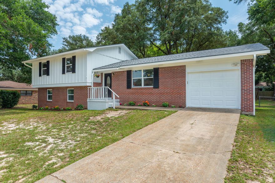 WOW, this home has all the space you need with 5 bedrooms, and 2 1/2 baths. This seller wants to ensure you are ready to move into your new home worry free.  Updated electrical (2023 see document section), new roof (2023), new hot water heater (2023), new carpet (2022), new stove 2023, freshly painted interior and exterior (2023) new garage door installed (2019).  The AC unit and duct work is less than 4 years old with storm windows as well. The home has an ADT alarm system. This house sits on a cul de sac for low traffic flow, has a huge fenced in backyard, large covered back porch, and workshop with electric, water and AC to work on your projects in comfort.  Sprinkler system and shed convey AS IS. Schedule your showing today.