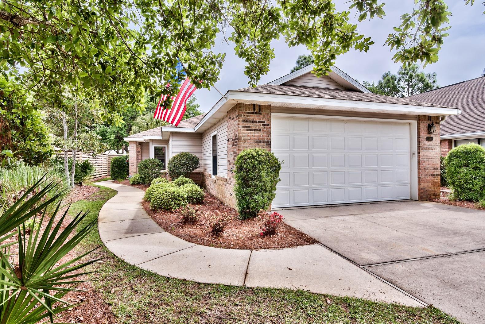 A rarity!- lakefront in the popular residential Sandestin community of Deerwood. Customized by the owners at construction, this 3 bedroom/3 bath home is over 2100 sq. ft., on one level, providing easy living for families large and small. The deck beckons all times of the day to fish, relax and watch the herons and egrets or let the kids feed the turtles. Inside the gleaming kitchen features a work island and abundant counter space. The gas fireplace is perfect for cool evenings and is the focal point of the open concept living area. The sunroom overlooks the lake and provides casual living space. The split floor plan gives extra privacy. The open area of the living/dining rooms is perfect for entertaining. Deerwood is an intimate community that is convenient to all Sandestin offers.