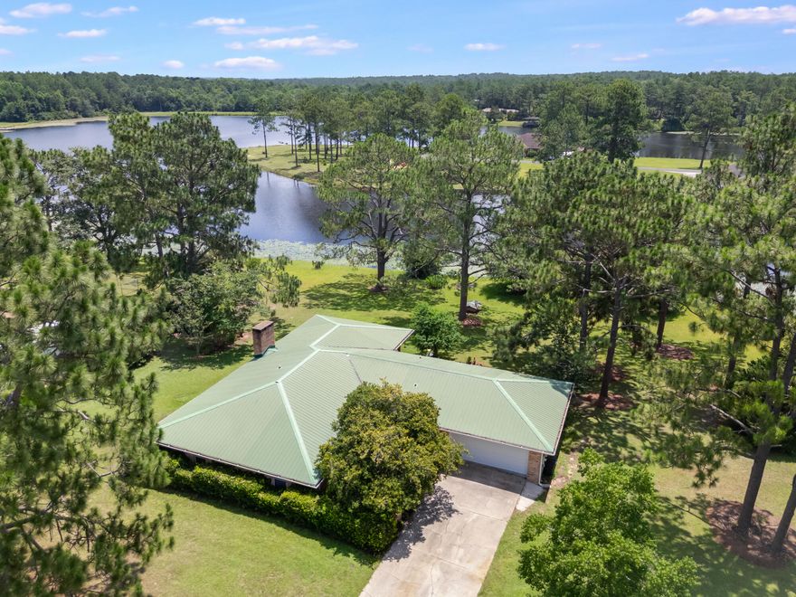 Waterfront living at its finest! This beautifully remodeled 1,898 SF brick home sits on a 1-acre lot directly on the big lake in Ten Lake Estates--one of North Walton County's premier fishing lakes known for trophy bass, bream, and crappie.Fully updated in 2017 by one of Walton County's top builders, this home features modern finishes throughout while retaining timeless brick charm. The spacious great room includes a wood-burning fireplace and flows into an open kitchen and dining area. Enjoy serene lake views from the screened-in back porch--perfect for morning coffee or evening relaxation.Located in a quiet, well-established community, this move-in ready lakefront property is a rare find. Don't miss your chance to own a piece of waterfront paradise!