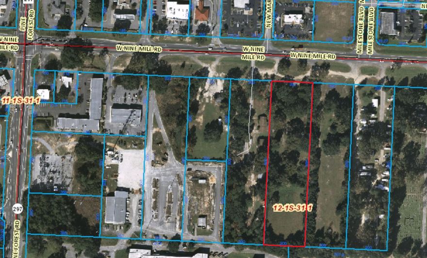 3.67 acre vacant commercial land just east of the intersection of Pine Forest Road and W Nine Mile Road, the adjacent parcel is also available that is the same size which could give you a 400x800 parcel for a total of 7.34 acres