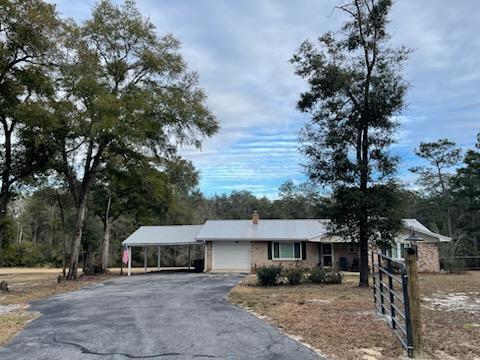 20 acre ranch only 40 minutes to 30A and the sugar sand beaches of the Emerald Coast. Magnolia Ranch is on 20 mostly-wooded acres. Drive a few minutes to Downtown Historical DeFuniak Springs! Check the famous DeFuniak Lake (the only naturally completely round, spring-fed lake in the US), stroll downtown, explore nearby springs like Ponce de Leon or Vortex, or drive apx 40min to the beaches of 30A! Our original, red brick home has 3 bedrooms, 4 beds, & 2 full bathrooms. Relax on the rocking chairs on the front porch! Magnolia ranch is a fully furnished turn key rental all the way down to the linens, appliances, including silverware and pots and pans. Included is yard maintenance, garbage, and internet. Tenant is responsible for electric and water. 2 keys & 1 garage door opener will be provided.