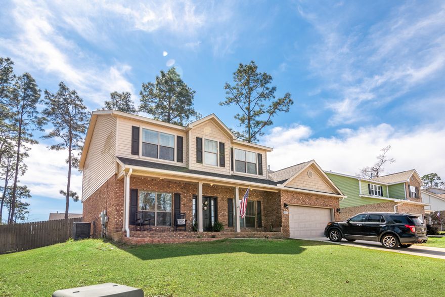 ROOM FOR THE WHOLE FAMILY! Don't miss this immaculate home in the sought after community of Brooke Estates. 18 foot ceilings and travertine flooring greet you in the foyer. Lots of living space including a formal living room and spacious family room. Bonus room on the ground floor could be a sizable 5th bedroom. The kitchen features include a dining area, large breakfast bar, granite countertops, TONS of counterspace and storage, and stainless appliances. Arched wall cutout allows you to be in the family room but not feel like you're missing any of the action going on in the kitchen. Half bath conveniently located in downstairs hallway. Upstairs, you won't want to leave your master suite with tray ceiling and huge master bath. Master bath features include double vanity,