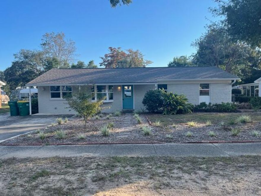 Super cute, renovated, 3 bedroom, 2 bath home in the heart of Niceville, just a short walk to schools & Lions Park, & an easy commute to bases, beaches, shopping, restaurants, & more. This home features neutral paint and no carpet throughout, an open floorplan with a spacious living room, updated, eat-in kitchen with quartz counter tops, flat cook top stove, kitchen island/breakfast bar, tile backsplash & more. There is a flex space next to the laundry room that could be utilized as a second living area, office, etc. The master bedroom has its own remodeled full bath, & the two nicely sized guest rooms share a remodeled full guest bath, as well. There is a screened in back porch overlooking the huge backyard, which is privacy-fenced and features a detached 1-car garage. Pets may be  considered on a case-by-case basis with prior owner approval and a non-refundable pet fee. No smoking, including vapes.