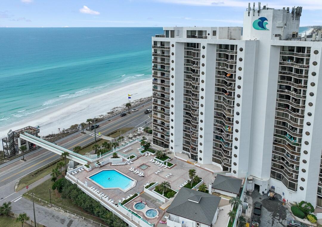 Gulf Views Forever! This 3BR/3BA Condo with Lockout Option at this price is a RARE find in today's market! Welcome to Surfside Resort #1508 a spacious and versatile 3-bedroom, 3-bathroom beach condo perched on the 15th floor, offering breathtaking, unobstructed views of the Gulf of Mexico from every bedroom and the living room.This unique floor plan offers flexible living and rental options. It can be enjoyed as a full 3-bedroom unit or divided into a 2-bedroom/2-bath main condo + a 1-bedroom/1-bath lockout suite, complete with a private entrance and kitchenette--ideal for maximizing rental income or hosting guests with added privacy. Read more... The condo comfortably accommodates up to 10 guests. The primary suite features a king-sized bed, offering a relaxing and private retreat. The second bedroom includes a queen bed, while the lockout suite is equipped with both a queen bed and a full bed, along with a convenient kitchenette perfect for added privacy or separate guest use. An additional sleeper sofa in the living room provides extra sleeping space for larger groups.
Step outside onto the expansive 15th-floor balcony, which is accessible from all three bedrooms and the living room, and take in panoramic Gulf views and the spectacular sunsets that Miramar Beach is known for.
Inside, the open-concept living area flows seamlessly into a fully equipped kitchen, making it easy to prepare meals after a day at the beach. Whether you're unwinding indoors or enjoying the coastal breeze outdoors, this condo offers the perfect blend of comfort, style, and functionality.
Resort Amenities
Surfside Resort offers a wide range of upscale amenities designed to elevate your beachside experience. Enjoy direct beach access via a private sky bridge, as well as a heated pool, hot tub, and sun deck perfect for relaxing under the Florida sun.
Stay active with access to the on-site fitness center, tennis courts, basketball court, and pickleball facilities. Indulge in on-site dining, visit the spa, or browse through retail shops conveniently located within the resort.
Additional conveniences include covered parking, 24-hour security, and a welcoming, community-focused atmosphere.
Situated in the heart of Miramar Beach, Surfside Resort places you just minutes from Destin's world-class dining, shopping, golf courses, and popular family attractions.
Whether you're seeking a turnkey investment property, a vacation getaway, or a full-time beach-style residence, Surfside Resort #1508 offers exceptional value and unbeatable Gulf Life living.