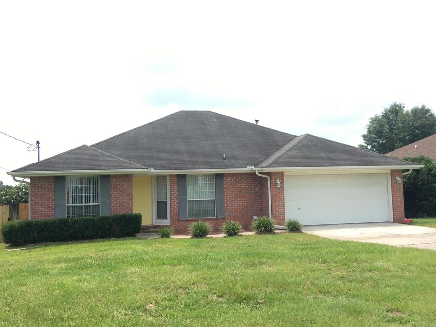 Split  4 bedroom 2 bath home south of I-10 off P.J. Adams Pkwy. Home is around the corner from Antioch Elementary School. (walking distance). Large master suite, master bath with  garden tub, double sink & vanity. Tile and wood flooring  in most of the home. 3 bedrooms have carpet. Large deck, privacy fence, new gate, new garage door opener 7/2021, New roof 10/21, fireplace, dining room, open kitchen with island & breakfast bar opens to great room. Kitchen appliances, washer & dryer are 'AS IS'. Property to be sold AS IS. Nice clean home!