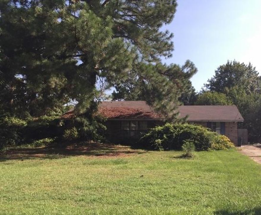 REO ~ Tons of Potential ... All brick ranch with swimming pool is centrally located in Miramar Beach is close to the bay & just 10 minutes to the beach! Living room has vaulted ceilings & sliders leading to pool area.