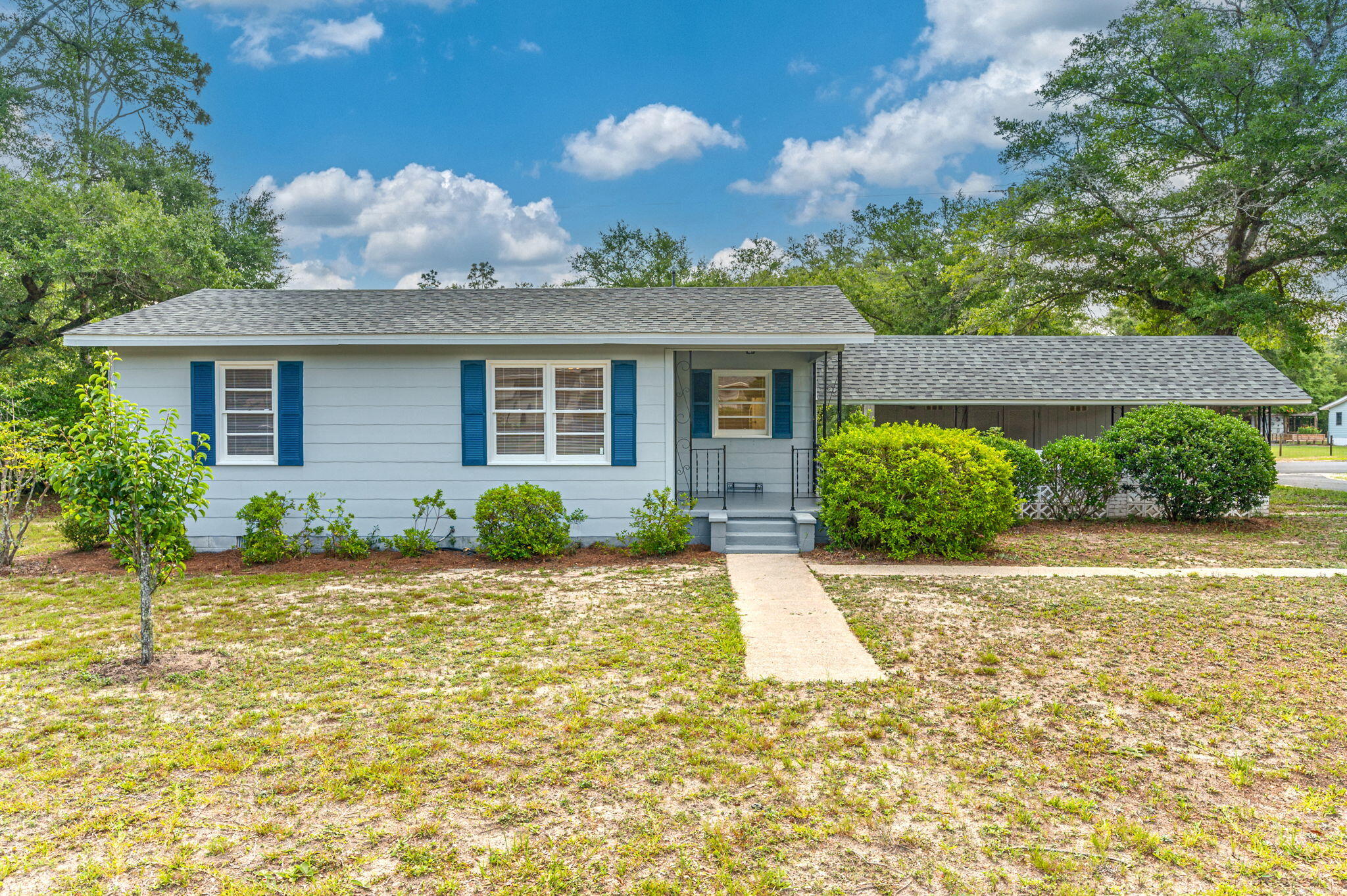 Quaint Florida cottage that lives larger than the numbers show! Open floor plan between the living room and kitchen, bedrooms are on one side of the home with full bathroom next to them. One of the most amazing features to this home is that there is road frontage on three roads and woods on the third side- so it gives you a country feel while being in the city limits! It does not get any more conveniently located then this! Application requirements are background check and credit check (for everyone 18 and over), credit score minimum of 600, household income of $3750 and one year consistent employment unless you are moving here for employment and can provide job offer letter! NO PETS