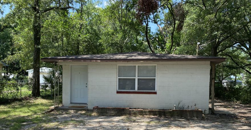 2 bedroom 1 bath home.  This property is shaded by large oak trees.  Nice size living area.  Open floor plan.  Central Heat and Air.  Lawn care is included.  Hurry this won't last long