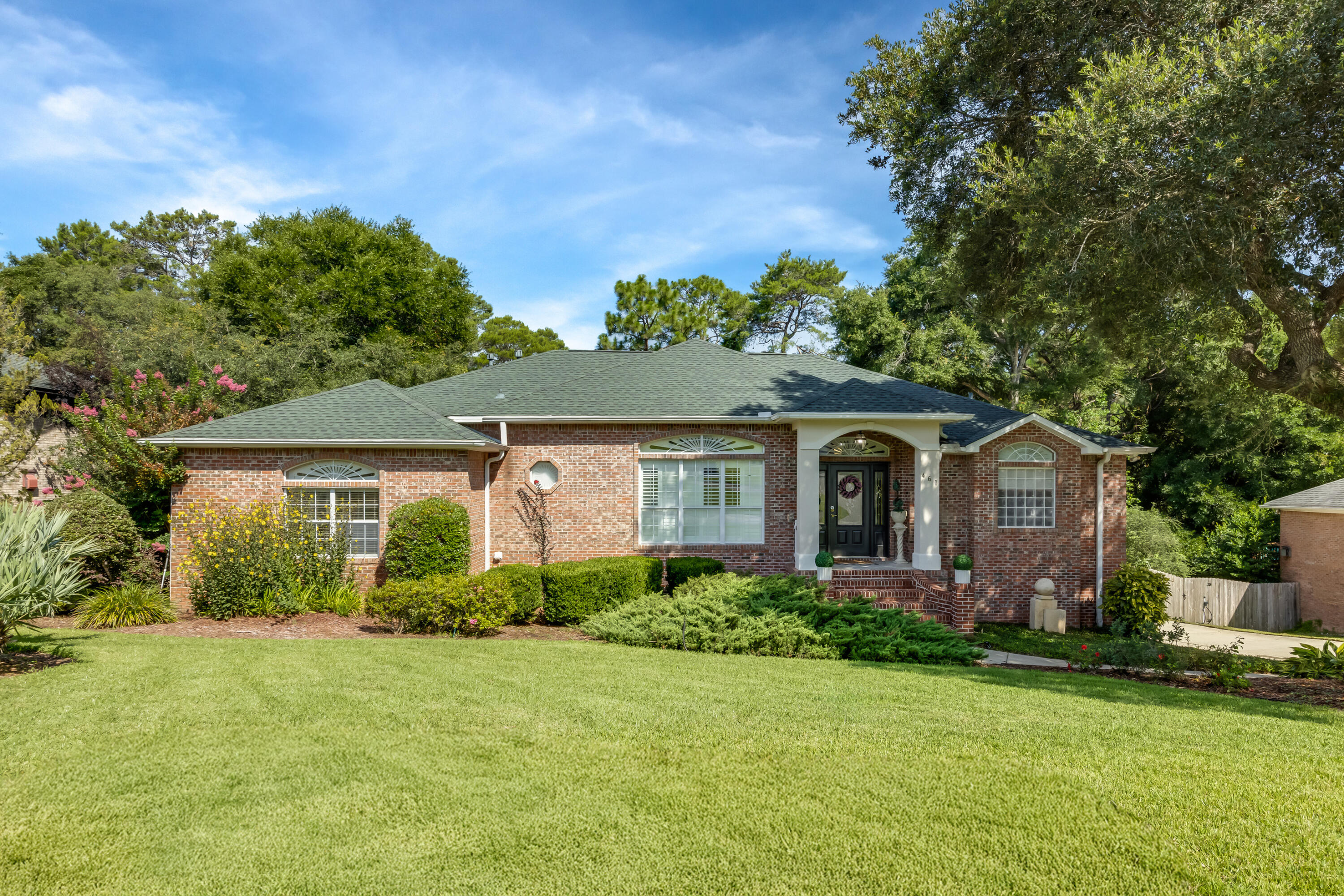 Custom Brick Home in Rocky Bayou | 4BR/2BA + Flex Room + Florida RoomSpacious and solidly built custom brick 4-bedroom, 2-bath home on a beautifully landscaped lot in Rocky Bayou Country Club Estates. Inside, you'll find solid oak wood floors, 10' trayed ceilings with crown moulding, and a formal dining room. The open-concept great room connects to a bright Florida room overlooking a private, tree-lined backyarda"ideal for relaxing or entertaining.The kitchen is a standout, featuring solid birch cabinetry, granite countertops, tile backsplash, gas stove, stainless steel appliances, extra-deep sink, and a 9' breakfast bar. The breakfast nook has a bay window with views of the backyard. The primary suite includes a trayed ceiling, dual vanities, marbled whirlpool tub, separate shower, and a custom walk-in closet. All bedrooms offer walk-in closets with pocket doors and ceiling fans.
Bonus flex room located off the garage perfect for a home office, gym, or hobby space. Tiled entryway, kitchen, laundry, and both bathrooms.
Additional features:
" Roof (2021)
" HVAC (2018)
" Water Heater (2019)
" Leaf Filter Gutter Guards (with warranty)
" Full irrigation system
" Fully fenced backyard with access gates
" Large wooden deck with natural gas line for grill and hot tub
" 15x12x8 under-home storage + under-stair storage
" Exterior outlets for holiday lights
Move-in ready, built to last, and located in one of Niceville's most established neighborhoods.