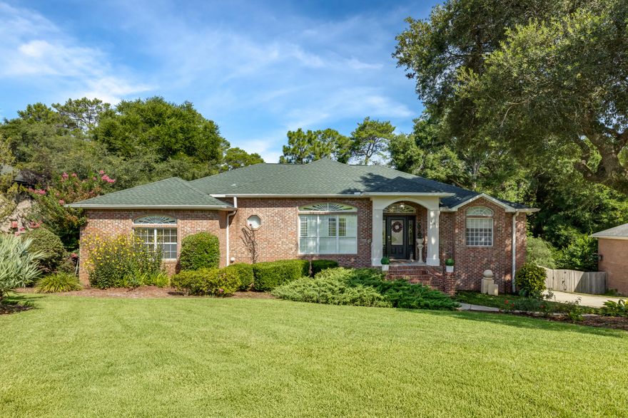 Custom Brick Home in Rocky Bayou | 4BR/2BA + Flex Room + Florida RoomSpacious and solidly built custom brick 4-bedroom, 2-bath home on a beautifully landscaped lot in Rocky Bayou Country Club Estates. Inside, you'll find solid oak wood floors, 10' trayed ceilings with crown moulding, and a formal dining room. The open-concept great room connects to a bright Florida room overlooking a private, tree-lined backyarda'ideal for relaxing or entertaining.The kitchen is a standout, featuring solid birch cabinetry, granite countertops, tile backsplash, gas stove, stainless steel appliances, extra-deep sink, and a 9' breakfast bar. The breakfast nook has a bay window with views of the backyard. The primary suite includes a trayed ceiling, dual vanities, marbled whirlpool tub, separate shower, and a custom walk-in closet. All bedrooms offer walk-in closets with pocket doors and ceiling fans.

Bonus flex room located off the garage perfect for a home office, gym, or hobby space. Tiled entryway, kitchen, laundry, and both bathrooms.

Additional features:
" Roof (2021)
" HVAC (2018)
" Water Heater (2019)
" Leaf Filter Gutter Guards (with warranty)
" Full irrigation system
" Fully fenced backyard with access gates
" Large wooden deck with natural gas line for grill and hot tub
" 15x12x8 under-home storage + under-stair storage
" Exterior outlets for holiday lights


Move-in ready, built to last, and located in one of Niceville's most established neighborhoods.