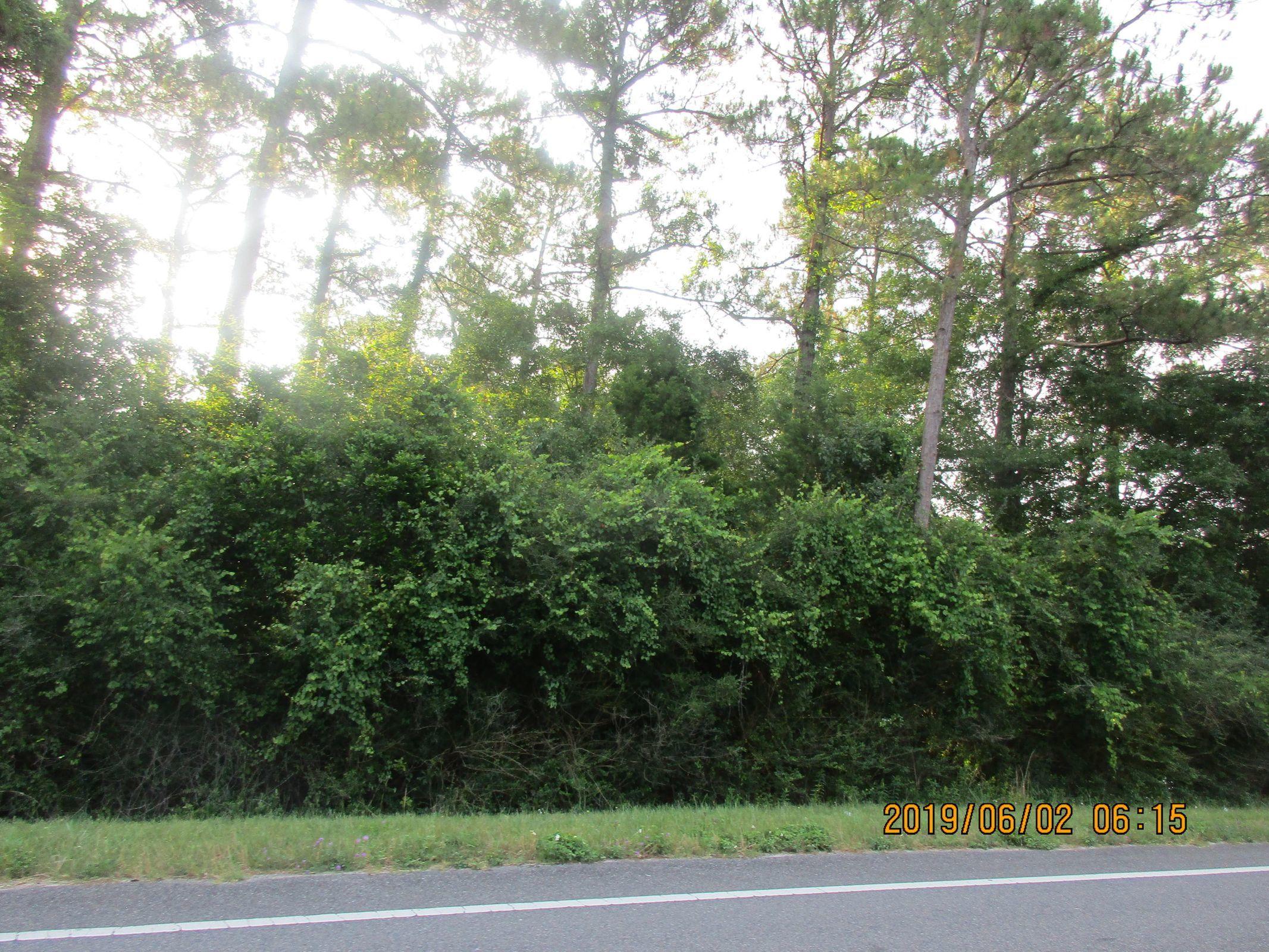 Beautiful Lot on Highway 83 North. This lot is located 1st lot North of the Wood fence on Highway 83. It is in Ten Lake Estates. This lot has a less restrictive size to build in Unit 1 than in other parts of the Ten Lakes Estates. Buyer to verify any information that is important to them. The seller has 4 lots together and will sell all for a discounted price. lot 50 has water view and lot 51 is on water. An awesome price for a lot in this subdivision