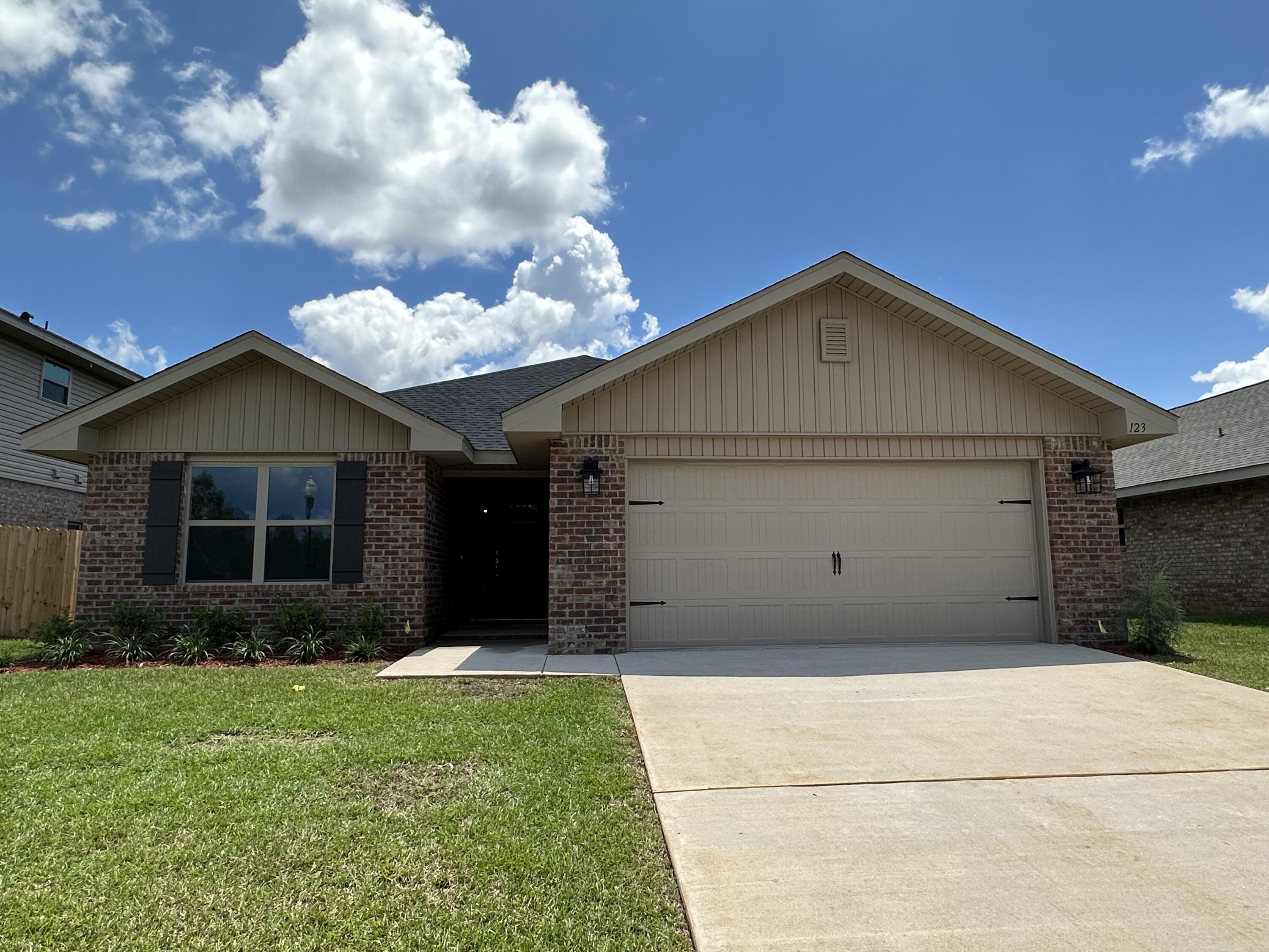 This 1634 square foot home is a must see! It is being built in our community Ridgeway Landing located in North Crestview. This is is 4 sided brick, offers 3 bedrooms, 2 bathrooms, cathedrial ceilings, a large master suite and so much more! The builder has added some upgrades to this home that include craftsman style elevation, quatrz countertops in kitchen and bathrooms, upgraded Puretech Plus flooring with carpet only in the bedrooms and a separate walk in shower and garden tub in the master bathroom. This property incuded an automated sprinkler system, comes fully sidded with a landscaping package, and termite bonds. This community offers street lights, sidewalks, and a beauiful community pool for your enjoyment!