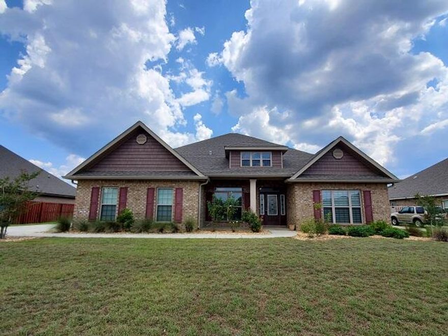 AVAILABLE 10/05/2022 - Shown by appointment only. STUNNING 5 bedroom 3 bath all brick beauty nestled in highly desirable Redstone Commons. Directly across the street from the elementary and middle school! How about LITTLE TO NO ENERGY BILL? Yes, this one sports solar panels which reduces your energy bill. The Brianne design features a split floor plan, soaring ceilings, recessed lighting, and beautiful archways. Kitchen has granite counter tops with under cabinet lighting, large island with built in sink., stainless appliances, and cooktop along with built in oven and microwave. 3 car garage, fenced in back yard and lush landscaping make this one irresistible! Large community pool with covered grilling area and dog park. Just minutes from Duke Field, Eglin AFB, Walmart, Lowes and