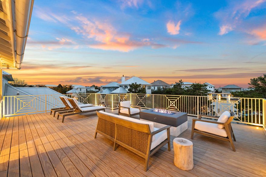 Positioned within the private gated enclave of Seanest Village, this newly constructed Greg Jazayeri design executed by the renowned team at Focus Construction seamlessly blends organic aesthetics with breathtaking views of the Gulf and surrounding topography. Upon initial approach, the gas lantern lit courtyard opens up to the entry foyer featuring venetian plaster surfaces and stunning European hardwoods that are carried throughout the residence. A pair of junior suites equipped with private-ensuites boasting floating vanities and custom built-in closets along with a two-car garage complete the first level. Doubling as a statement of craftsmanship, the wood adorned staircase with metal accents leads way to the living and dining areas configured with entertaining in mind.