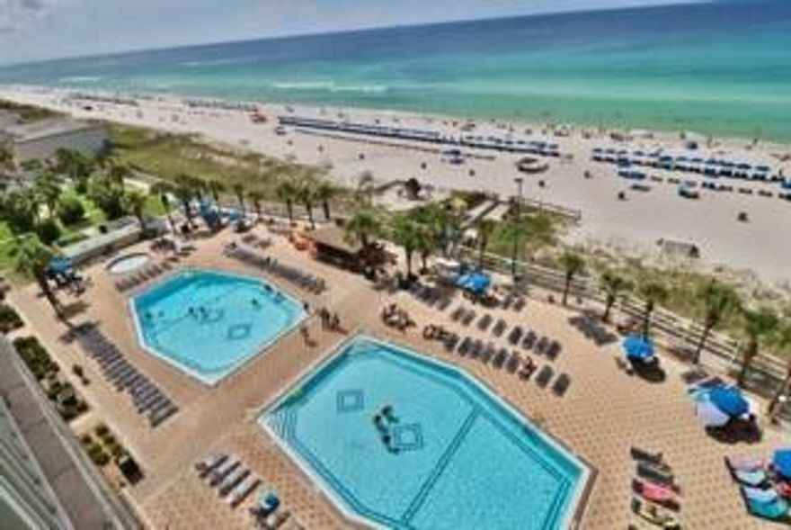 Just steps away from the beautiful sands of PCB from this great location on the ground floor of the Summit! MUST SEE This condominium is located on the beautiful beaches of the Gulf of Mexico in Panama City Beach, Florida. It is at The Summit on Thomas Drive. You will find yourself within walking distance of restaurants, amusement parks, golf courses, and more. Grills are provided on site if you enjoy cooking out. There is also a TIKI bar in the pool area which is close to the beach so you can get a cool drink any time without leaving the property. A bar and grill called Bikini Bobs is onsite for food The Summit has two large pools for guests as well as both indoor and outdoor hot tubs! An exercise room is located on the ground floor near the lobby for guests as well!
