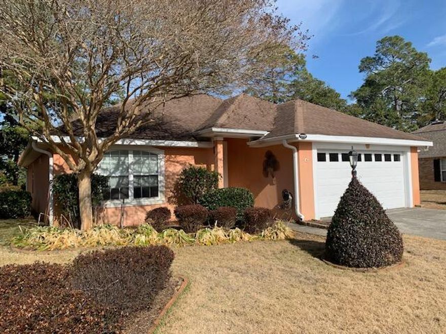 New roof, new HWH. Beautiful 3bed/2bath/2car home on the 9th fairway of the Bluewater Bay golf course. Convenient location and only minutes to the white sand beaches of the Emerald Coast.  Interior features an open kitchen with breakfast bar, solid surface counter tops, and tile floor, a utility room with washer/dryer and large pantr'; vaulted ceilings in dining and living rooms, built-in bookcases flanking the fireplace, hardwood floors and vaulted ceiling in the primary bedrooms as well as two walk-in closets, double vanities, and a jetted tub/shower combo in the primary bath.  Hurricane shutters, lawn pump and sprinkler system.  Florida room and open patio.  Make this community your home!