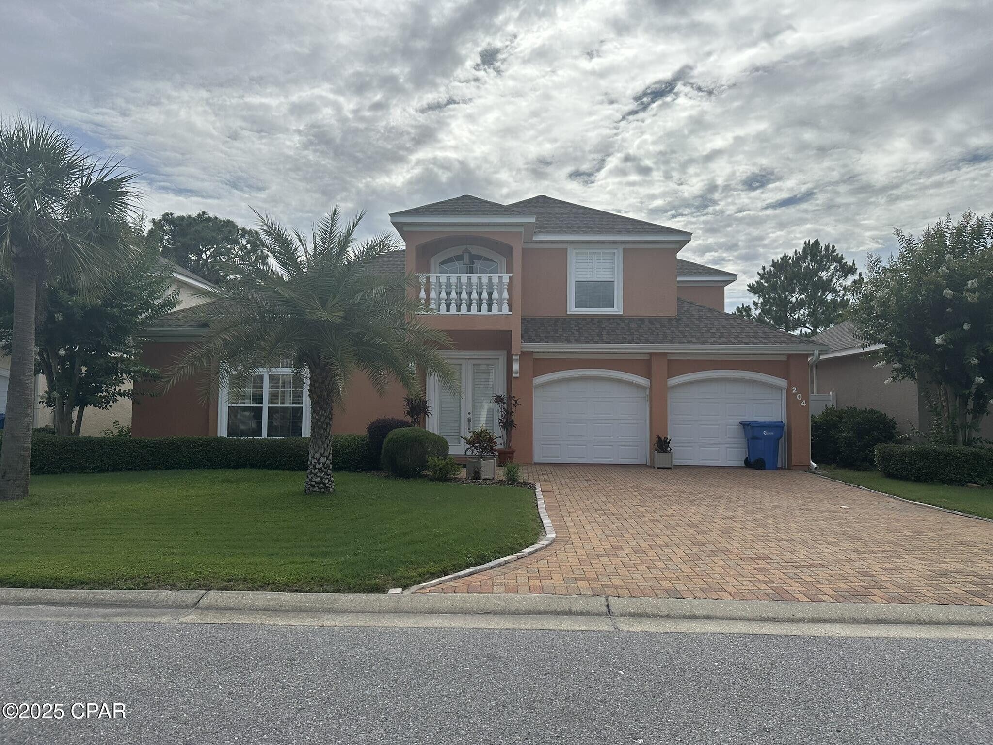 Welcome to this charming two-story home close to the beach, located in a quiet, well-maintained neighborhood. This beautifully kept 3-bedroom, 2.5-bath home offers a spacious and inviting layout perfect for everyday living or a relaxing coastal getaway. Step outside to your own private oasis featuring a screen-enclosed pool, perfect for cooling off on warm beach days or entertaining guests year-round. With peaceful surroundings and the beach just minutes away, this home offers the best of Florida living.