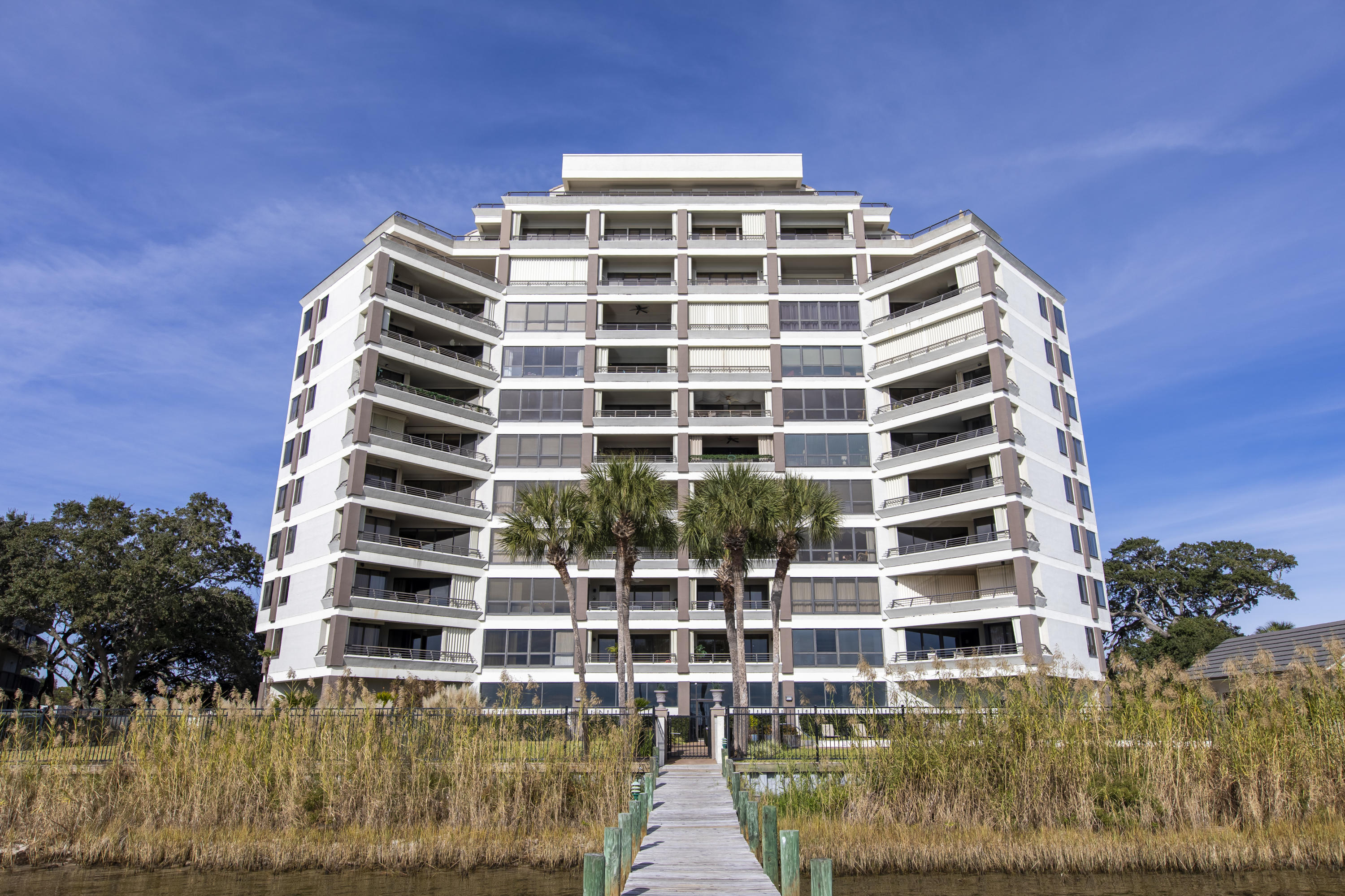 Upgrades are abundant in this stunning waterfront condo. Located in a non rental building, Unit 102 offers a quiet and serene stay on the Emerald Coast. Kitchen cabinets and appliances have been upgraded./replaced and the sub-zero refrigerator has had the parts replaced. Unit is sold furnished with the exception of a few personal items. A deeded boat slip and boat lift come with this unit, and storm shutters have been installed on the rear balcony.