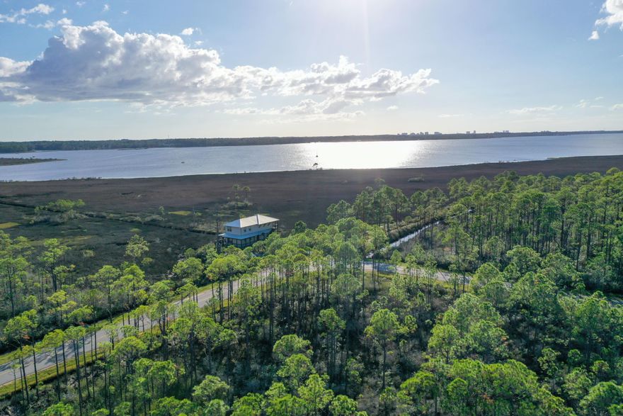 Wooded 5 acre parcel with Bay Views. Located at the corner of W. Nursery Rd. and N. Church St. This property is zoned Conservation Residential, allowing 1 unit per 2.5 acres. In speaking to the County, it could potentially be split into 2 lots. Very close to Cessna Boat Ramp, with a children's park, boat launch, fishing dock & picnic tables. Under contract with a kick out clause.