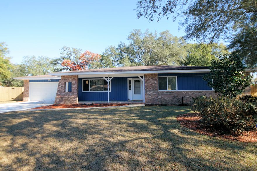 Here is your opportunity to own this lovely move in ready home in the heart of Niceville. Spacious 4 bedroom 2 bath home has been freshly painted inside and out. Lovely hardwood floors throughout the main living areas with carpeting in the bedrooms. Spacious master bedroom features it's own bath with newer tile shower and wood look tile floors. There is plenty of space to spread out with three additional bedrooms.  Backyard w/ a shed, a large covered patio, and a new wood fence. New landscaping in the front yard complete with new sod. Attached is 2-car garage with a new concrete driveway. Home has been updated with Pex plumbing, vinyl windows, and doors. The house also comes with a gas generator and more! Lawn pump and sprinkler system are being sold 'as is'.