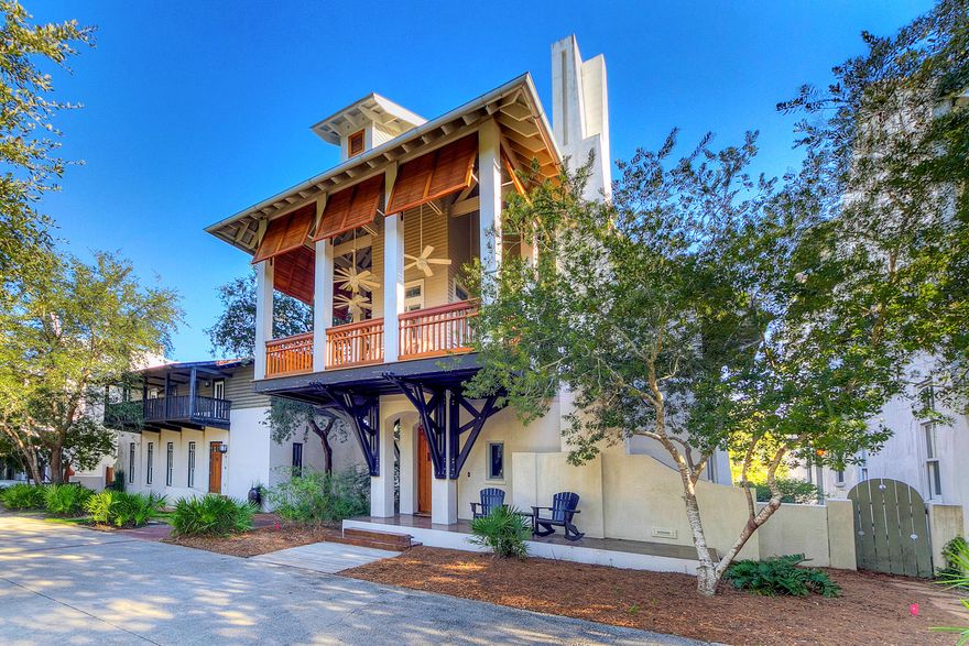This Chic Beach House design by Architect Alex Krumdeick is positioned 1 block from Rosemary Beach Town Center and minutes down the Boardwalk to the Beach. An outdoor courtyard with Summer Kitchen and Fountain adjoins the spacious, open Living/Dining/Kitchen. The floating steel staircase is position in a vaulted window to bring in vast natural light. Climb the architecturally intriguing staircase to the second floor which offers two master suites, each enjoys an en suite bath with double sinks and separate tub/shower. Each master bedroom offer its own private balcony with views of the local scene. Step it up even higher and find a third floor loft space furnished with two nestled bunk bed sets and private bath as well as a cozy media lounge.