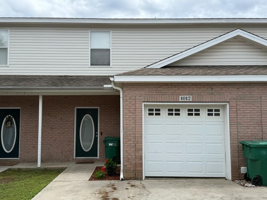 Charming Townhome in the Heart of Fort Walton Beach! Beautifully maintained 3-bedroom, 2.5-bath townhome offering 1,396 square ft of comfortable living space. Nestled in a prime central location, you're just minutes from shopping, schools, dining, and the beach! The open-concept main level features a spacious living room, a bright kitchen with breakfast bar, and a convenient half bath. It offers an updated kitchen with newer cabinets and granite countertops . New appliances include: refrigerator w/ice make garbage disposal and dishwasher. New AC unit within a 1 year . New flooring throughout.1 car garage and 2 driveway spaces. HOA includes green areas maintenance, sprinkler syst. and pest control