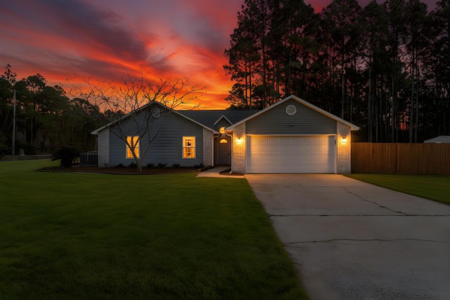 || OPEN HOUSE THIS SATURDAY 12/20 11am to 1pm. ||  Some neighborhoods get talked about for a reason. Holley By The Sea and its endless amenities is one of them, and this home sits quietly on one of its most desirable parcels.Set on a massive corner lot, the property feels unusually private for a community this sought after. Tall trees surround the backyard, creating a peaceful, almost hidden retreat that makes it easy to forget you are just minutes from everything. That kind of seclusion is rare here, and it shows the moment you step outside. Inside, the recently renovated home opens up in all the right ways. Vaulted ceilings and an open layout keep the space feeling light and easy, with windows everywhere pulling the outdoors in. The flow works for real life, whether that means hosting friends, spreading out on a quiet afternoon, or just enjoying a home that does not feel chopped up. Durable LVP floors run throughout, and the kitchen keeps things clean and modern with stainless appliances that fit the space without trying too hard.

Out back, the covered patio becomes an everyday escape. The yard is large enough to do just about anything with and private enough to actually enjoy it. A full irrigation system is already in place, complete with a sheltered lawn pump built to handle Florida weather, and the large storage shed includes a dedicated mower port so the practical stuff stays out of sight.

The unglamorous but important updates are already handled. The roof was replaced in 2023, the septic system has been recently serviced, and a new grinder is installed. Not exciting to shop for, but very nice to already have done.

Location matters too. Navarre continues to grow, values are on the rise, and this spot offers easy access to nearby military bases while still feeling relaxed and residential.

Living here also means access to Holley By The Sea amenities, including multiple pools, tennis courts, a full gym, sports courts, ball fields, an event hall, youth programs, a boat launch and dock, and even RV and tent camping. It is one of those communities people specifically ask about, and this home delivers the kind of lot that is hardest to find within it.

Quiet without being isolated, well maintained without being overdone, and set in a neighborhood that continues to prove its value. It feels good the moment you arrive, and that feeling tends to stick around.