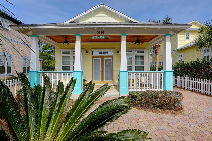 This Beach home is what you've been waiting for! 3 Bedrooms/2 full baths in quiet cul-de-sac, close to the beach and under $500,000! Everything is on one level for easy living with open concept living/dining and kitchen area. Kitchen offers stainless steel appliances, beautiful maple cabinets and granite countertops. Tiled bathrooms with granite countertops, glass tub enclosures and handheld shower heads. Master bedroom has en-suite bath and walk in closet. Special features of this home include Travertine flooring throughout, plantation shutters, Kichler & Casablanca fans, wooden shelving in closets, surround sound audio, security system and furnished with Tommy Bahama and EKornes stressless black leather furniture. Plumbed for Culligan water purification system, drip irrigation from main water system and water pressure regulator. Carrier air/heat pump installed in 2012 & Invisiguard window film on windows. 
This home is perfect for a full time, rental or second home. Fenced backyard, covered back patio and welcoming front porch offer relaxation. One of the two neighborhood pools and the tennis courts are just a few feet away. 
Home is offered furnished except for a few personal items so it's  move-in or rental ready! Come see this home and enjoy the beach life!