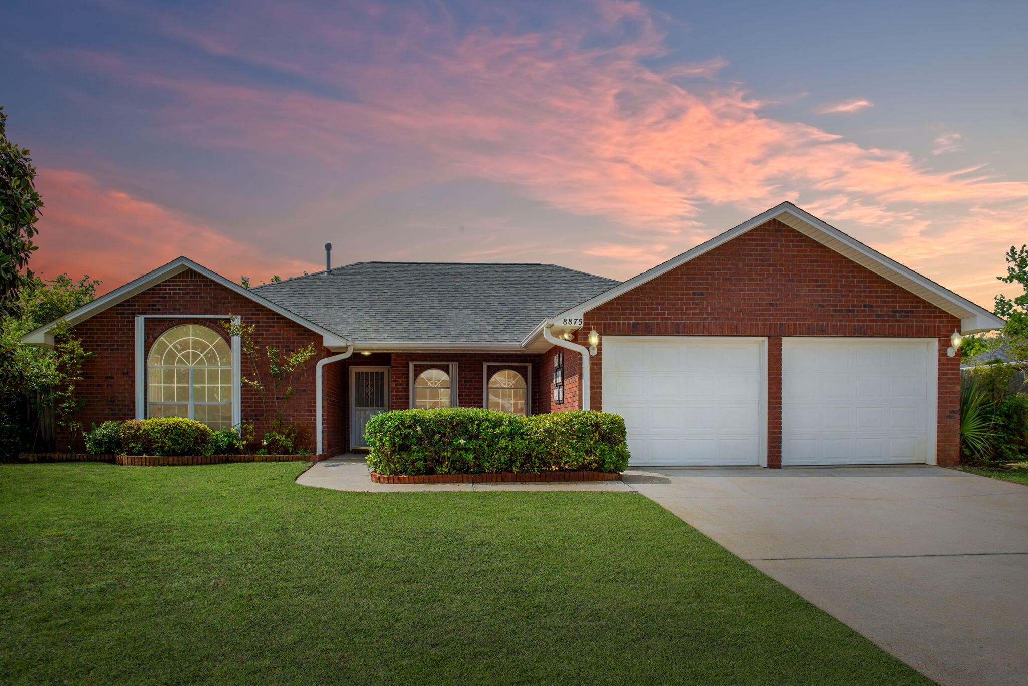 Welcome to your dream oasis! NO HOA; This stunning 4-bedroom, 2-bathroom home is a rare gem nestled just 1 mile from the beach, (9 miles to Hurlburt Field) offering a serene escape with unbeatable convenience. New Stove! Step into luxury as you're greeted by gleaming NEW LVP flooring that flows throughout the spacious interior. Entertain in style in the expansive 14 x 15 glassed Florida room, adorned with ceramic tile flooring, where you can bask in the tranquility of your own private bird sanctuary. Unwind on the charming and peaceful10x10 patio featuring a pergola frame, or soak up the sunshine on an additional uncovered patio - perfect for outdoor gatherings and al fresco dining. No need to worry about the elements, as this home boasts hurricane shutters and a new roof installed 2022! with architectural shingles: The heart of the home is the gourmet kitchen, complete with granite countertops, a beautiful grey ceramic backsplash, and NEW waterproof luxury vinyl plank flooring and hardwood throughout home. Indulge in relaxation in the master suite, featuring double vanities, a separate tiled shower, and a luxurious garden tub in the master bath. The master suite invites you to a genuine retreat, offering a spa-like experience and a spacious walk-in closet. For added security and convenience, enjoy the peace of mind provided by the Feit electric floodlight with a Wi-Fi security camera. With no homeowners association to restrict your lifestyle, this home offers the ultimate freedom to live and play as you please. Feature sheet in documents but include: New Roof 2022, AAA Taylor 3 zones Irrigation landscaping system with pump, HVAC Trane XL 18i Seer, Hurricane Shutters, Hardwood Flooring, Gas Rheem 50 Gallon Water Heater, Gas Grill/BQ hook up; Granite countertops 2022, LVP 2025, New lighting fixtures, Fans, New Stove 2025, Smart Code Keyless entry 2022, Glassed Florida Room with removable glass panels! gas and wood fireplace providing security, energy efficiency, and perfect settings for cozy family evenings. Don't miss out on this unparalleled opportunity to own your own piece of paradise - schedule your showing today!