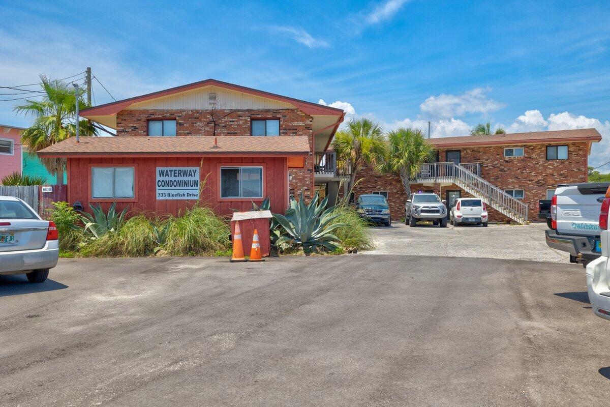 Have you ever been to the Keys? Ever wanted to LIVE in the Keys? Come check this place out!! The property is right on the sound; has its own white sand beach; boat dock with deeded boat slip; and you can sit right on your balcony and enjoy the water views. It's always 5 o'clock here!!!Association has pest control performed every 3 months -- last time was 5/12/22. Electric averages $85/mth through FPL & home owners insurance (personal belongings) is $700/yr through Harris. Water heater 2021. Electric panel 2021. Carpet in guest bedrm 2021.I have added all but Declaration to MLS (file too large) Let me know & I will email separately.