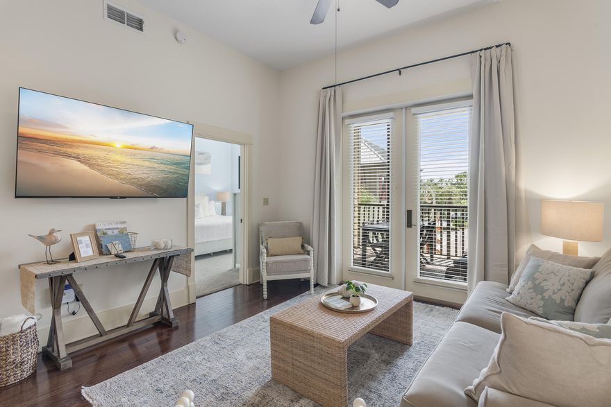 Experience the best of coastal living with this beautifully appointed Redfish Village condo in the heart of Blue Mountain Beach. Just one block from the sugar-white sands and crystal-clear waters of the Gulf, this property is the perfect investment for a vacation retreat or a luxurious full-time residence.Hop on the complimentary 6-person golf cart shuttle for easy access to the PRIVATE beach entrance, complete with bicycle parking, restrooms, showers, and a rinsing station for your beach gear.Redfish Village offers resort-style amenities, including a large seasonally heated pool, a smaller heated kids pool, luxury Viking gas grills, a gated children's playground, and a scenic boardwalk that leads to the serene Redfish Lake.Unit M1-219 is ideally located near the elevator and comes with a reserved parking spot. The community also features a stylish owners lounge with a private terrace, wet bar, cozy sitting area with a library, a theater room with surround sound, and a 24-hour fitness center.

This is your chance to own a piece of paradise in one of 30A's most desirable communities - don't let it slip away!