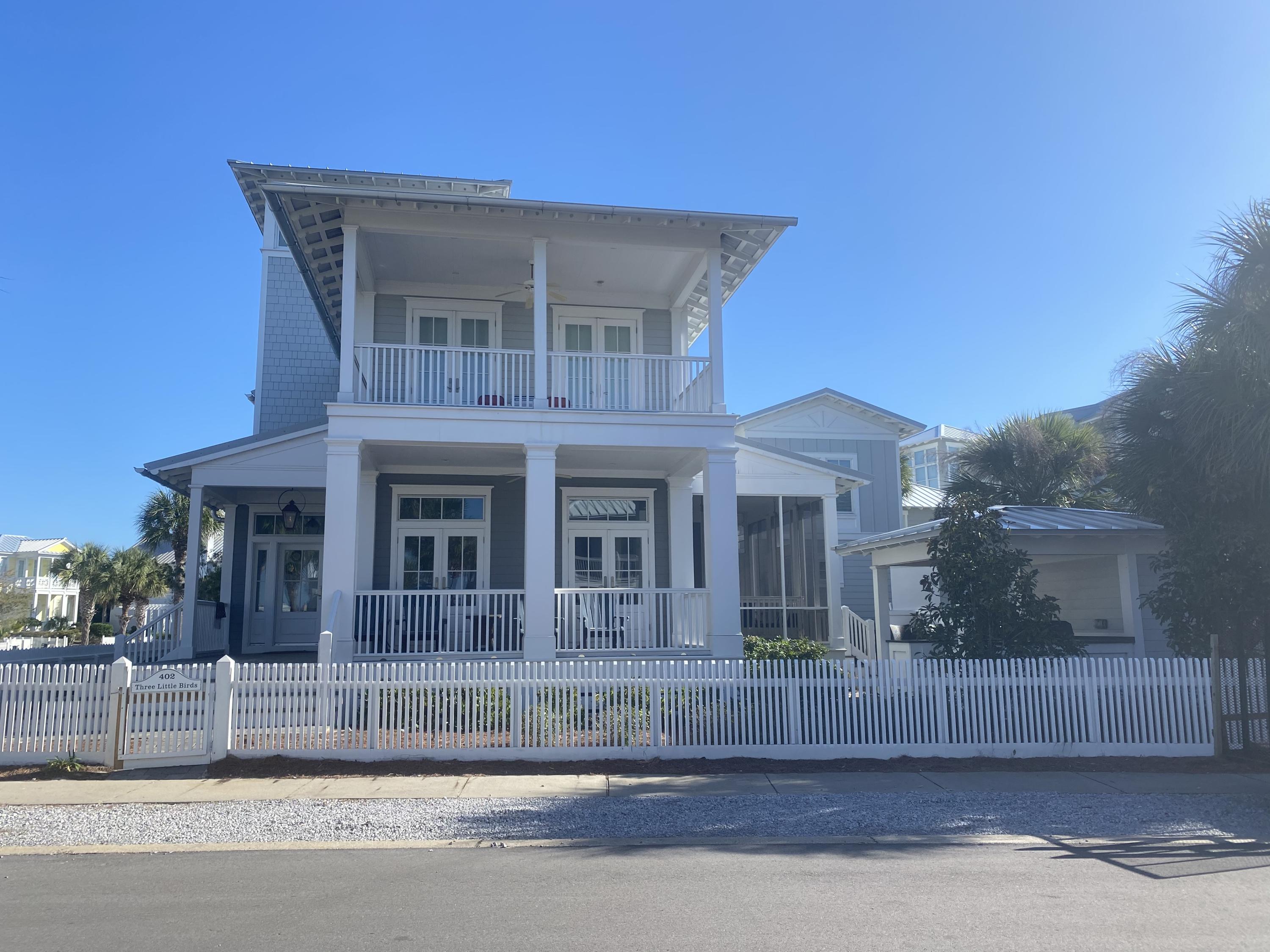 Located on a corner lot and creating an extraordinary complex, this property consists of main house, guest house, outdoor kitchen, outdoor fireplace and open 3rd floor viewing tower. The main house consists of 4 bedrooms (two masters), a bunk room, 3-1/2 baths, open floor plan with kitchen, dining and living space, first floor screened in porch and tower. The guest house has two bedrooms and 2-1/2 baths and great second floor living-dining-kitchen area with 1/2 bath. Both houses have outdoor showers. This property is located directly across the street from the Lake Carillon swimming pool and the Gulf of Mexico. This house has great rental income!
