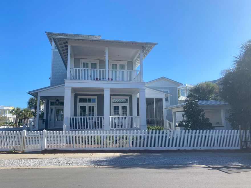 Located on a corner lot and creating an extraordinary complex, this property consists of main house, guest house, outdoor kitchen, outdoor fireplace and open 3rd floor viewing tower. The main house consists of 4 bedrooms (two masters), a bunk room, 3-1/2 baths, open floor plan with kitchen, dining and living space, first floor screened in porch and tower. The guest house has two bedrooms and 2-1/2 baths and great second floor living-dining-kitchen area with 1/2 bath. Both houses have outdoor showers. This property is located directly across the street from the Lake Carillon swimming pool and the Gulf of Mexico. This house has great rental income!