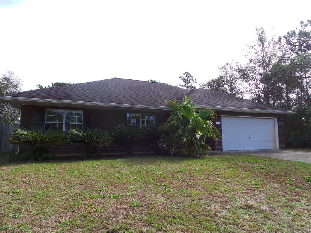 Great 3 bedroom, 2 bathroom brick home with a split floor plan located in the heart of Navarre! Privacy fenced backyard with open patio out the French doors in the living room. Open floor plan makes the home feel and look much larger. Living room has high ceilings and plant ledges. Large master suite with trey ceilings, HUGE walk in closet and carpet flooring. Home is convenient to beaches, shopping, restaurants and more!