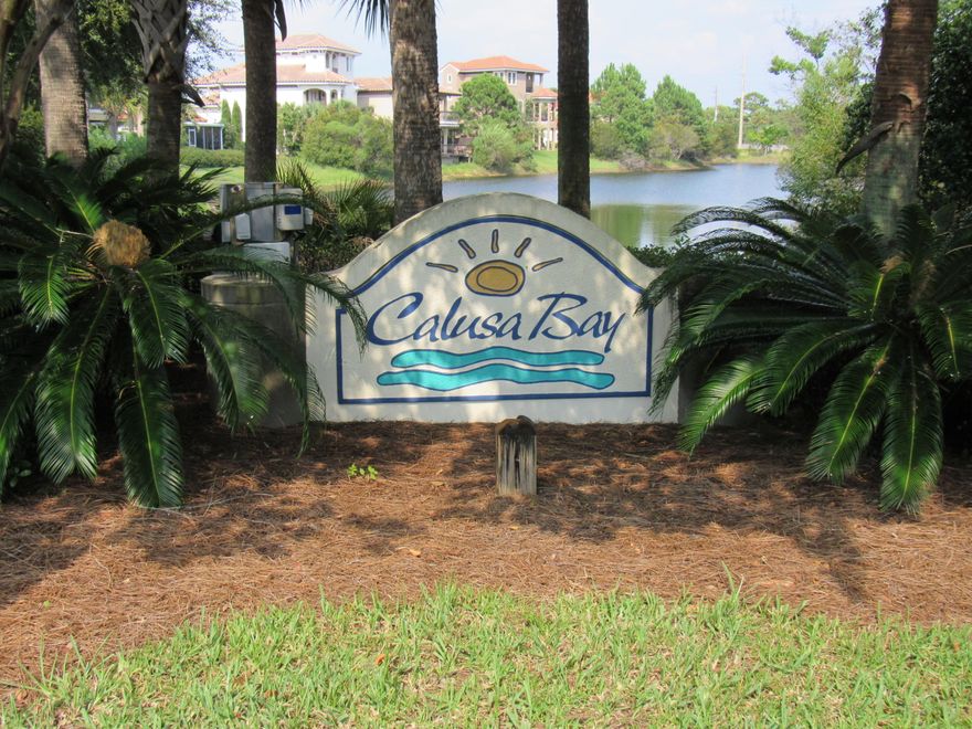 Welcome to Calusa Bay! What a great location to build your dream home! It is a gated community with community pool and Mediterranean Style Homes. You can custom build within the parameters of the covenants and restrictions. Subdivision is near Destin Commons, many shops, restaurants and the beach! There is golf cart deeded access from Calusa Bay to Regatta Bay golf course for your golfing convenience. Call today for your appointment to see this lot!