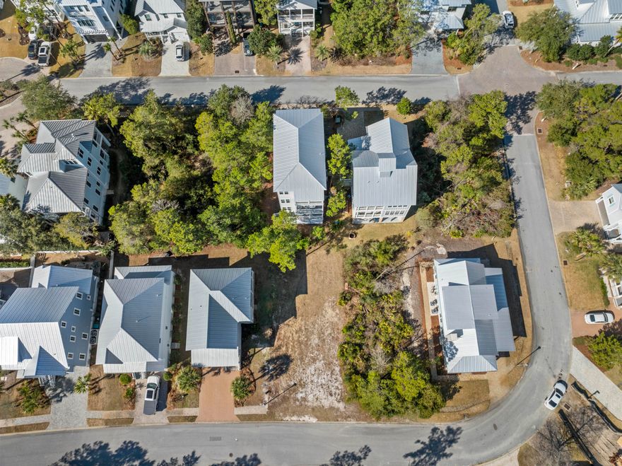 Grande Pointe is phenomenally located in Inlet Beach. The neighborhood features a lakefront large community pool with dock and access to Lake Powell. Within walking/biking distance to the Gulf of Mexico, 30A, & 30Avenue and the new underground tunnel making navigating across Hwy 98 stress free. The multiple beach accesses and acres of State owned beach make Inlet Beach great for everyone whether full time living, second home or a vacation rental. This is a great building lot in a private corner of the neighborhood. Outline of pictures is meant to be a guide, but not representative of exact property lines. All details to be verified by buyer.