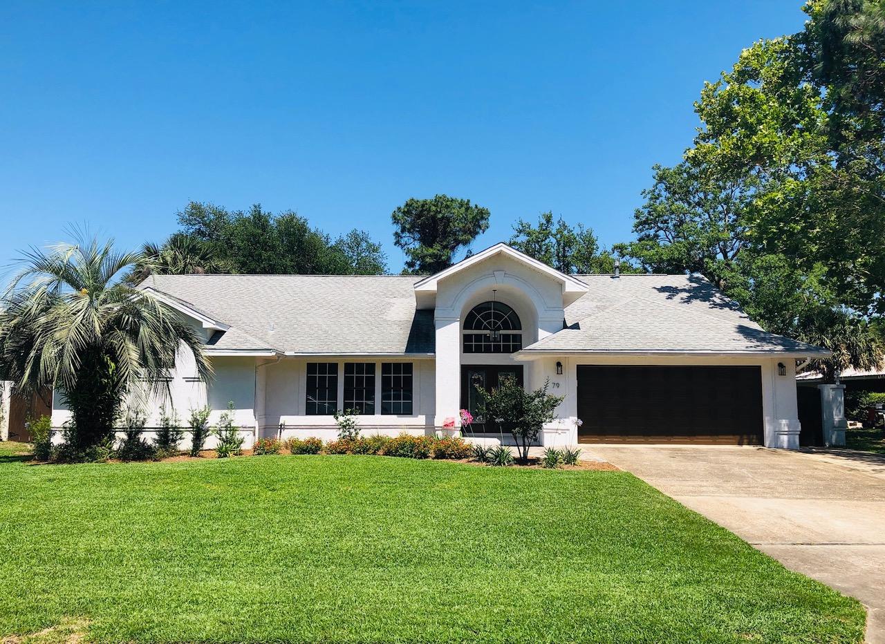 No detail spared in the EXTENSIVE RENOVATIONS to this Raintree Estates 4/2 split floor plan home! The custom-built foyer will be the perfect place to shed off the day and enter your peaceful home. The property features an open floor plan with vaulted ceilings in all common areas and MBR. The open kitchen/family room area has new Pergo LVP flooring. Spacious family room is highlighted by modern linear gas fireplace and built-in TV. Open to the family room and eating area, the custom kitchen has been entirely updated with stainless appliances, soft-close shaker kitchen cabinets, large island, quartz countertops and glass tile backsplash. For the master suite & add'l information on the home click for The master suite opens to Florida room and includes generously sized bedroom, large master bath with garden tub, shower, dual vanities and dual walk-in closets. Large carpeted living room and secluded office/flex/playroom separate the master suite from the rest of the home. Oversized screened Florida room leads to the large backyard that exudes Florida charm with its numerous palm trees and tropical plants. Sprinkler system is fed by a well to keep that yard looking great without breaking your pocketbook in water bills. Raintree Estates has an optional $100 HOA fee that helps keep the community beach park/dock, community ball park and walking trails ready for your enjoyment. Additional details: stucco exterior, nearly all flooring replaced recently, all rooms painted in last three years, full home generator included (not hooked up to electric), and transferrable termite bond. The following convey with an acceptable offer: both kitchen and garage refrigerators, microwave, tall cabinets in office, trampoline, washer, gas dryer, bar stools and patio set!