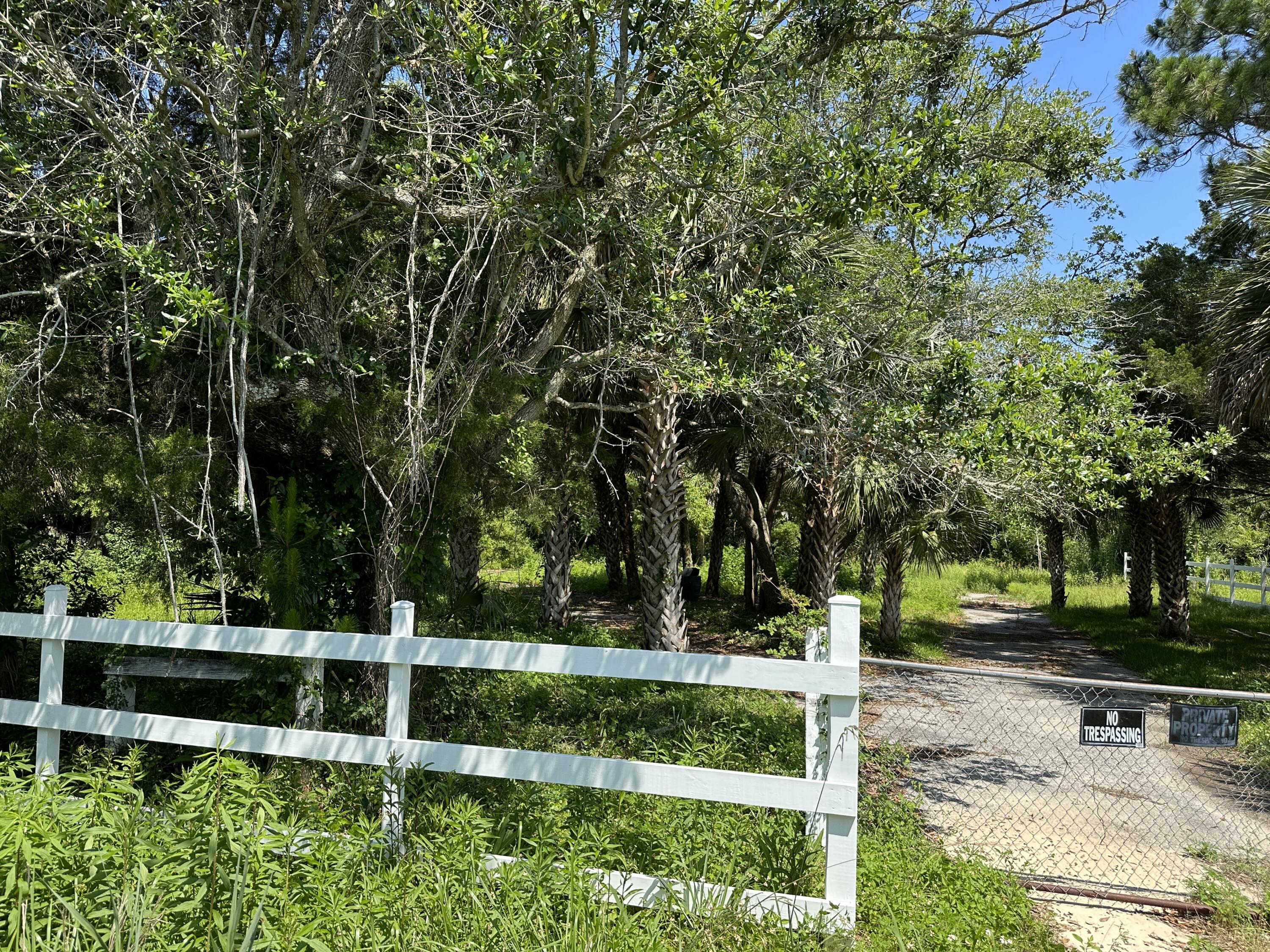 Water views! Unobstructed CHOCTAWHATCHEE BAY VIEW potential.Very large 140' x 210', (.53 acre) lot on Hwy 20 adjacent to Mullet Creek across the highway from the beautiful bay and Walton County Park. The park has a convenient public boat launch. Build your new home up on pilings and enjoy the beautiful bay water views. Land zoned RV (Rutal Village) allowing two units per acre. Property has City water. Septic tank required. Buyer to confirm all information and zoning requirements.