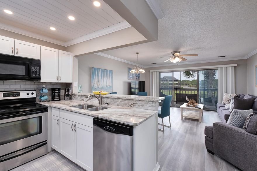 Great Location!! This lakefront 3 bedroom 3 bath villa is a must see. Located on Stewart Lake and just steps from the beach and community pool. Seascape has 2,000 feet of deeded beach, 5 pools, 18 hole golf course, tennis courts, RV & boat storage, conference center, Whale's Tail Restaurant, and more.