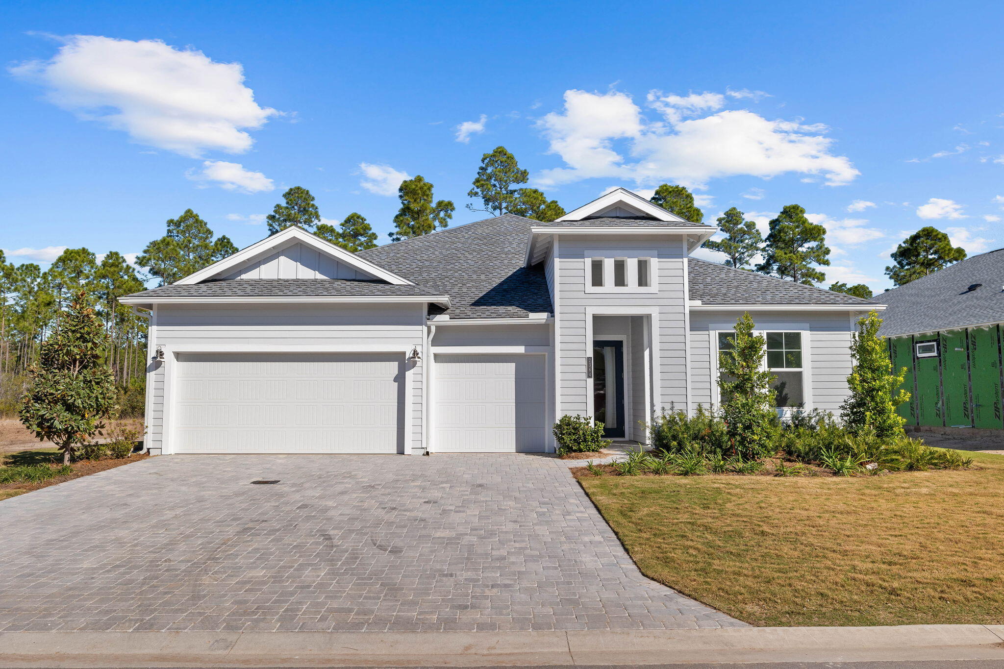 This spacious and functional 4 Bedroom floorplan features a large Island Kitchen overlooking an open main living area, perfect for hosting family and friends year-round. The large windows and French doors lining the Great Room's rear wall welcome in lots of Florida sunshine and keep the home bright and inviting. The design offers split bedrooms with a large Master Suite in the rear, offering dual vanities, a large walk-in closet, and an oversized shower with options to include a free-standing tub. The two secondary bedrooms are located in the front of the home, with Suite 3 offering an en suite Bath. The Den provides a perfect home office, gym, or hobby space, and with an option to include double doors, you can increase the privacy and functionality of the space.
