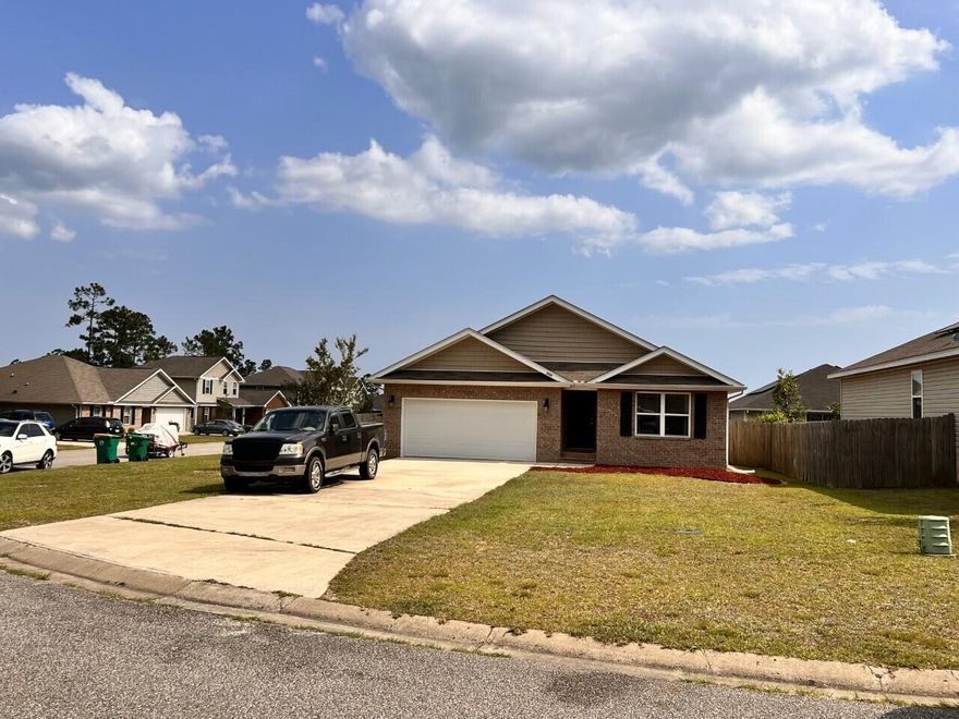 LOCATION, LOCATION, LOCATION.  South of I-10 and just minutes from Duke field, 7th group and Eglin AFB. You'll love this very open floor plan with 4 bedrooms and 2 baths sitting on a corner lot.  You'll enjoy the split floor plan.  This home is perfect for entertaining.   It's open floor plan opens up to a covered deck for grilling.  The kitchen has a spacious island, walk in pantry and custom spice racks, smooth top range, microwave and dishwasher and upgraded refrigerator. This split floor plan offers an oversized master bedroom, double vanity in the master bath and walk-in closet. The durable water resistant vinyl plank flooring offers peace of mind to any parent or pet owner to include added comfort with carpeted bedrooms.  Enjoy the double gate, perfect for a boat! Call today for a